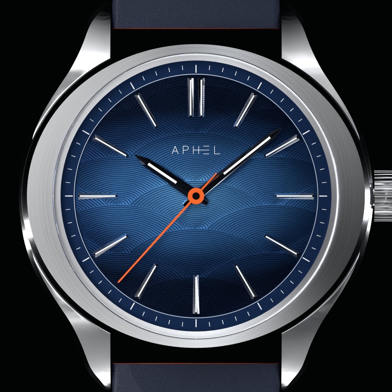 Gros plan du cadran bleu à écailles elliptiques : réhaut et minuterie, index appliqués, double index à 12 h, seconde orange